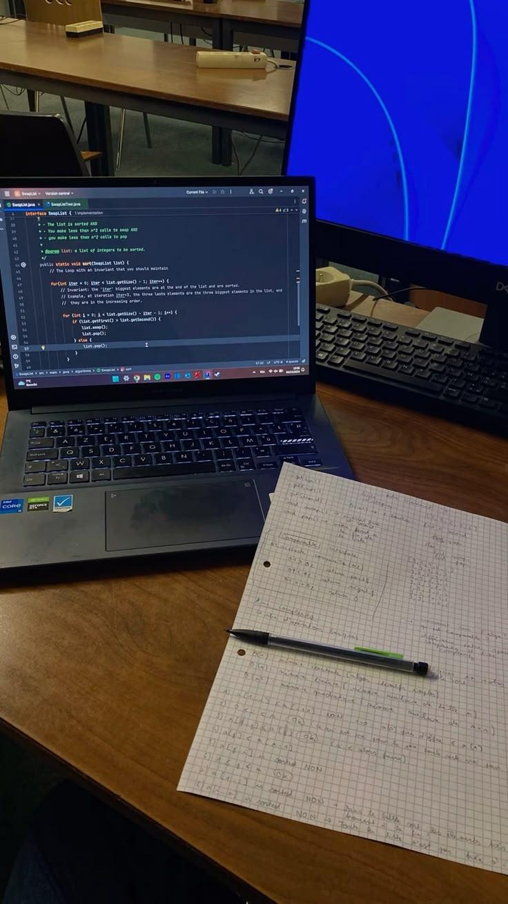 Mobile app project planning workspace with devices and development tools